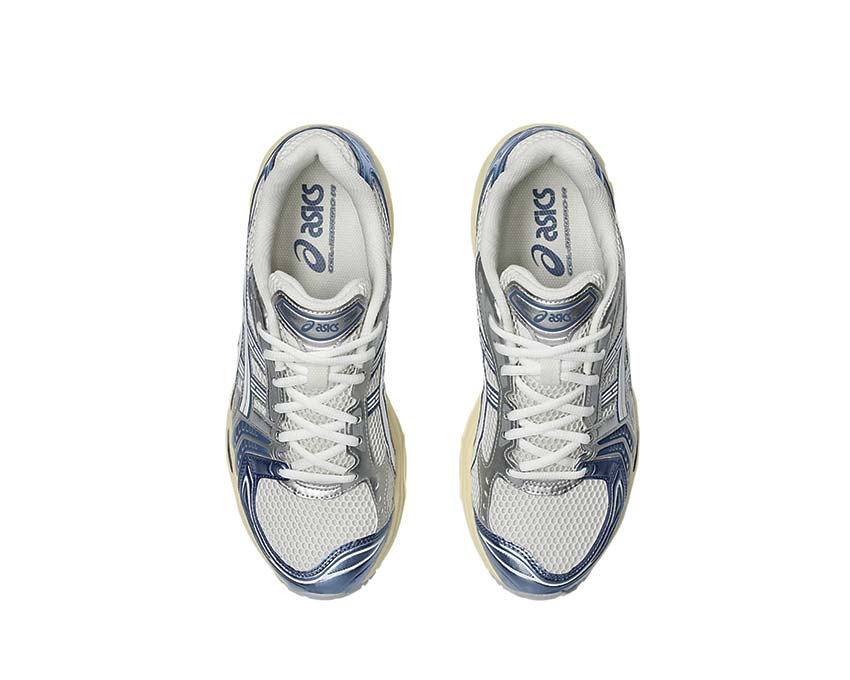 Asics Gel Kayano 14 Cream/Denim Blue vista trasera — amortiguación Gel talón