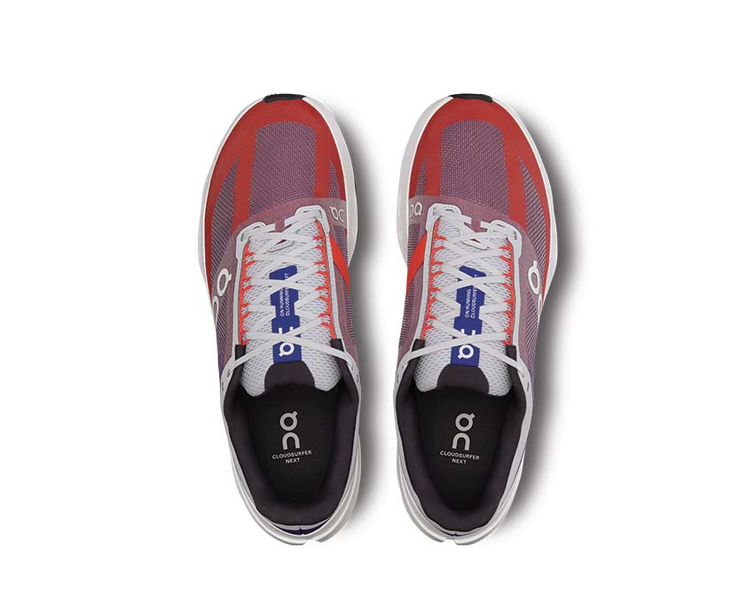 On Cloudsurfer Next Indigo/Flame detalle — mesh aireado zapatilla running hombre