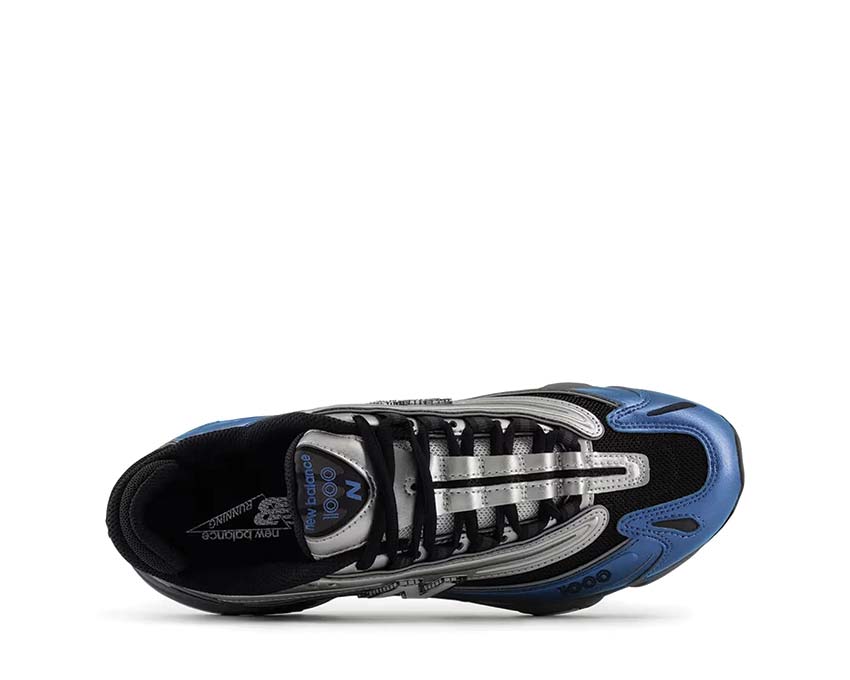 New Balance 1000 Metallic Blue détail — matière métallisée et mesh premium