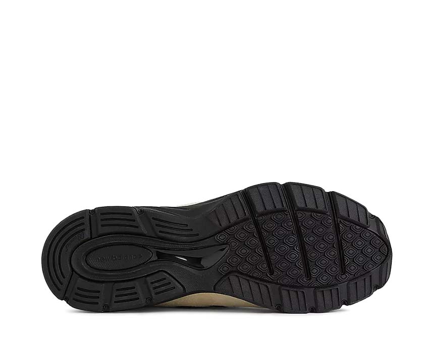 New Balance 990v4 Macadamia Made in USA — rear view black and beige heel
