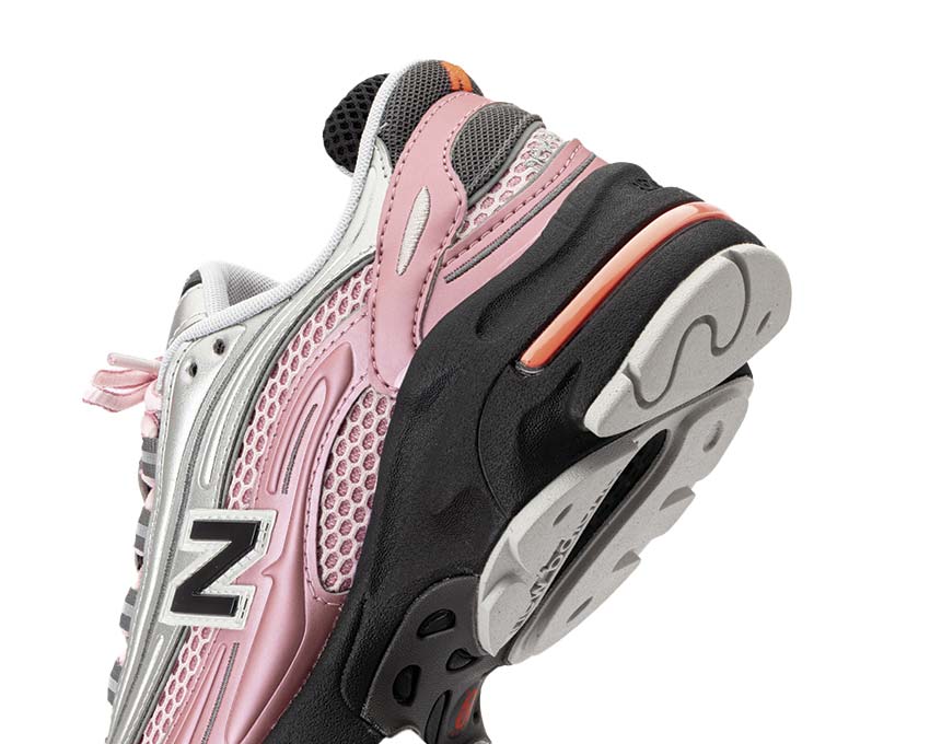 New Balance 1000 Pink Taffy vue latérale — silhouette trail cuir rose taffy