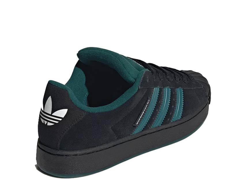 Adidas Superstar ST Core Black vue dessus — languette personnage adidas ST