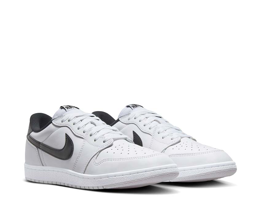 Jordan Air Jordan 1 Low '85 Metallic Black White Black Neutral Grey vista lateral — cuero liso