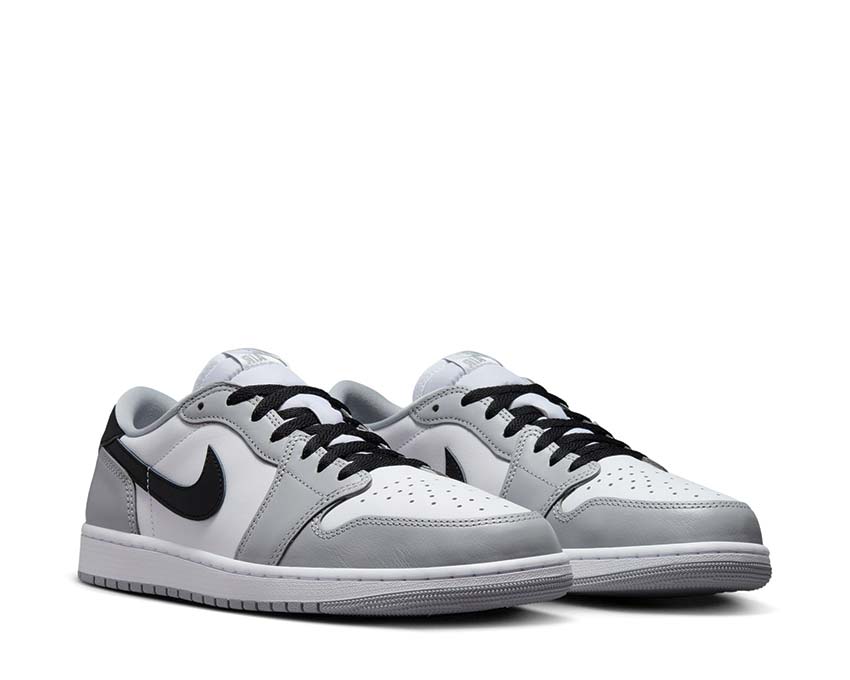 Jordan Air Jordan 1 Low OG Wolf Grey vista lateral — cuero liso gris hombre