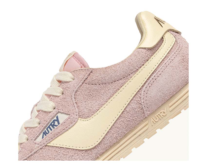 Autry Windspin W Low Rose vue latérale — daim et cuir rose pastel