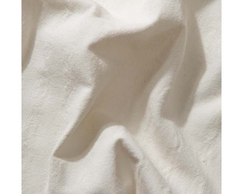 Edmmond Studios Giorgios Short Sleeve Off White vista lateral — tejido ligero veraniego