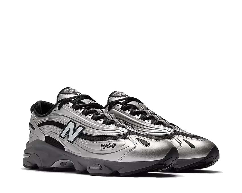 New Balance 1000 Metallic Silver lateral view — silver sheen on premium upper