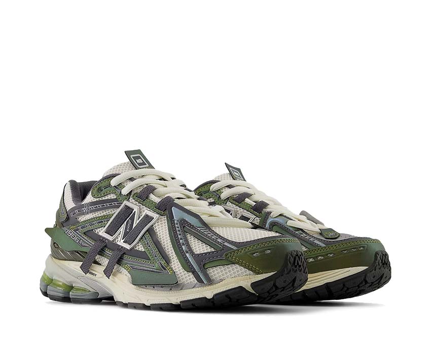 New Balance 1906A Olive Juice/Sea Salt/Woodland vista lateral — parte superior de malla multicapa