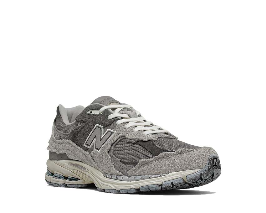New Balance 2002R Rain Cloud/Magnet vue latérale — tige mesh et cuir nubuck traité
