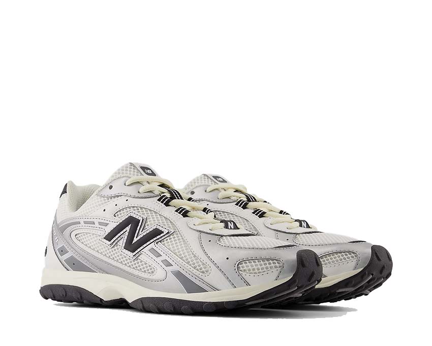 New Balance 204L Silver Metallic vue latérale — profil argenté irisé tige lisse