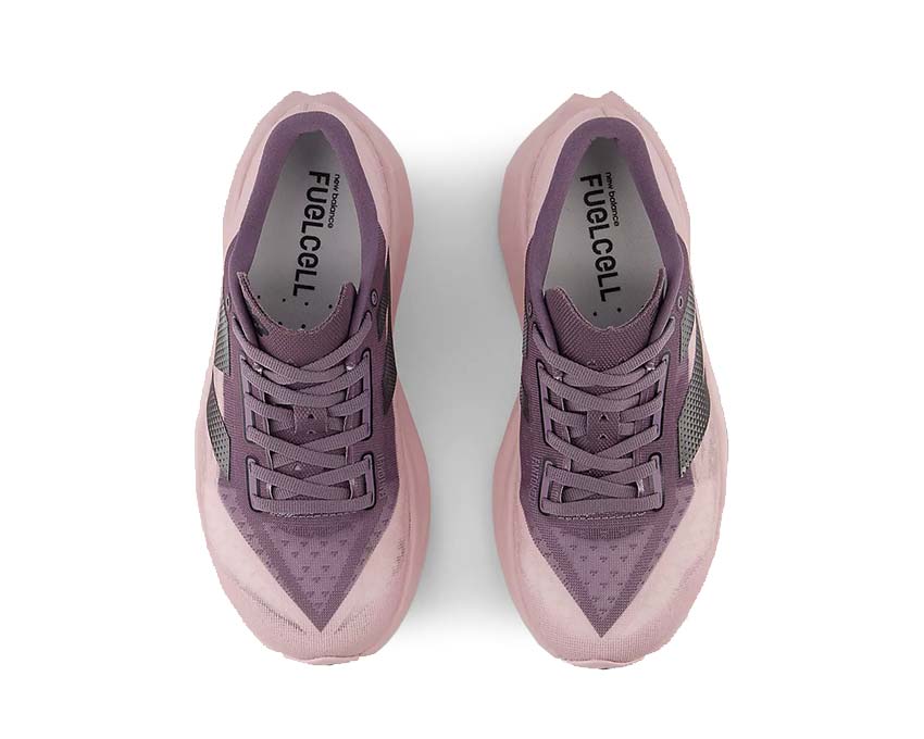 New Balance FuelCell Rebel V4 Dark Ice Wine detalle — amortiguación running mujer dinámica