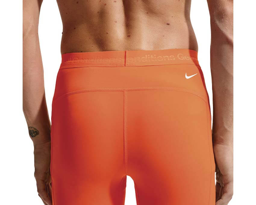 Nike ACG Wildsee Dri-FIT Tights vue dos — collant trail homme base layer ACG orange