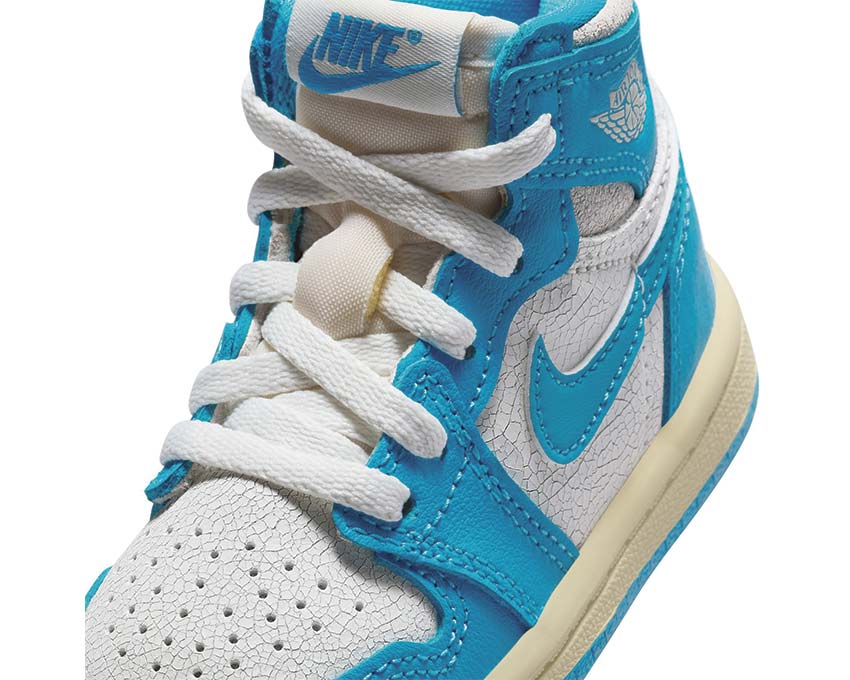Jordan 1 Retro High OG UNC Reimagined TD side view — aged leather Carolina blue baby