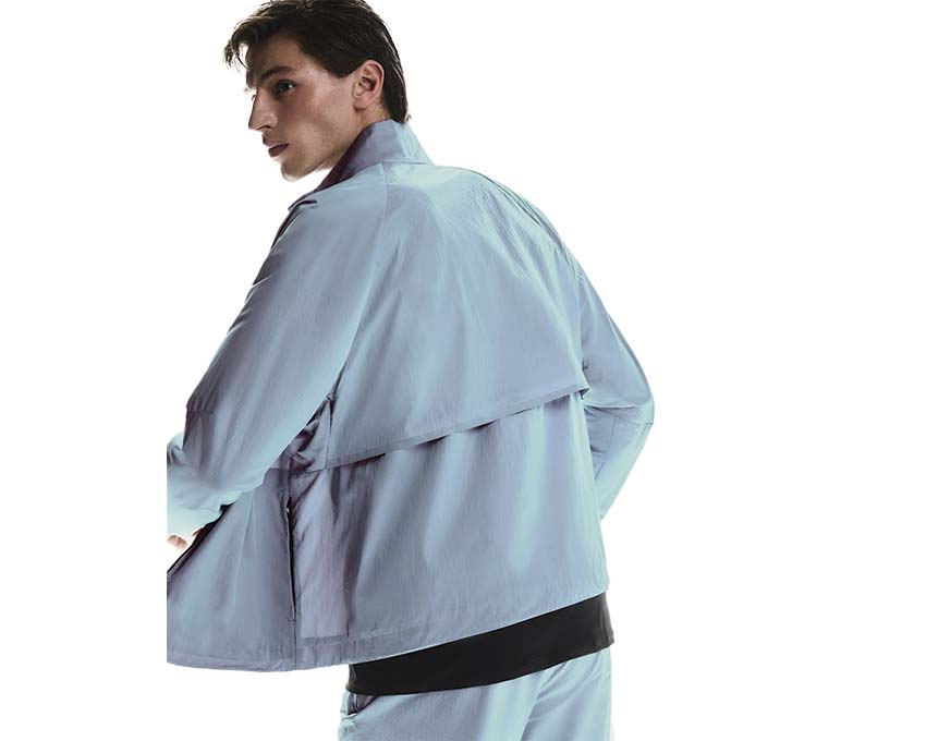 On Court Jacket M Geyser détail — manches façonnées veste tennis On Running