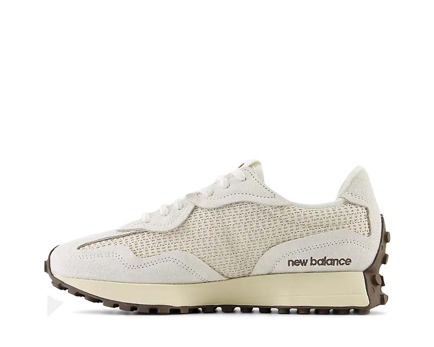 New Balance 327 detalle — gran logo N distintivo