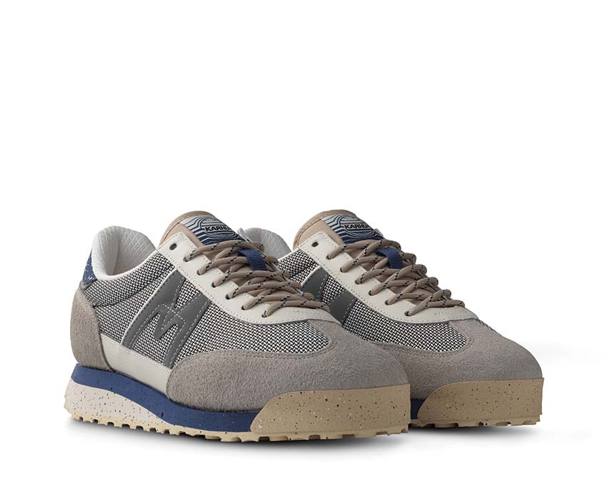 Karhu Mestari Control Silver Lining/True Navy vista lateral — mesh transpirable