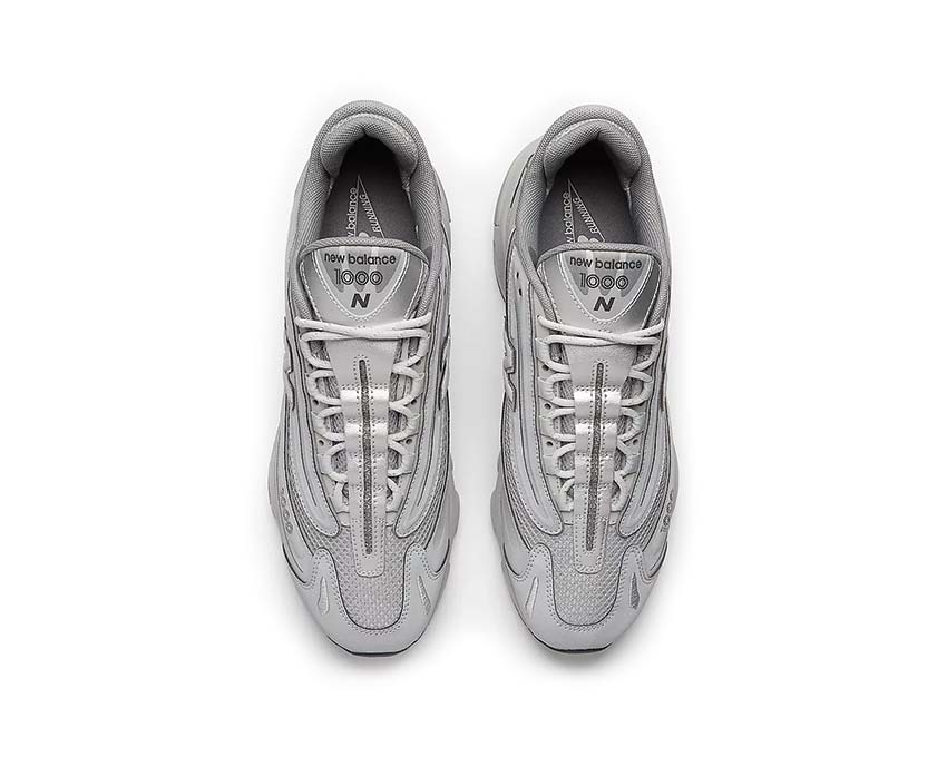 New Balance 1000 Silver Metallic Raincloud detalle — logo N plateado bordado