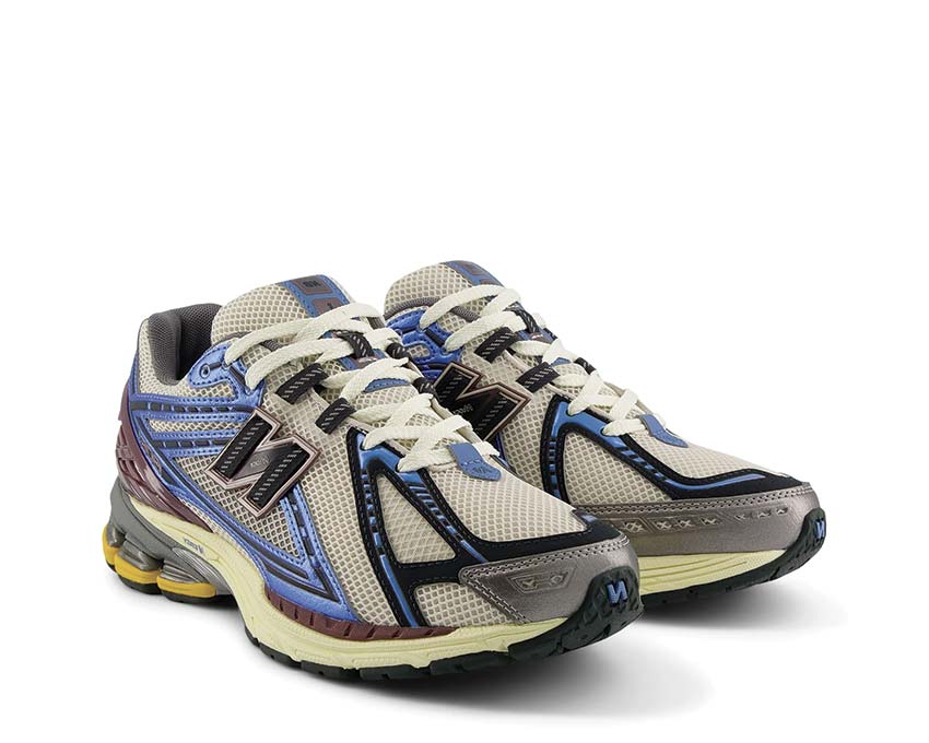 New Balance 1906R New Spruce vista laterale — tomaia mesh e camoscio sovrapposti