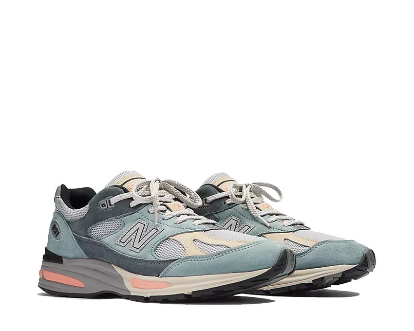 New Balance 991v2 UK Silver Blue Turbulence vista laterale — tomaia camoscio grigio blu