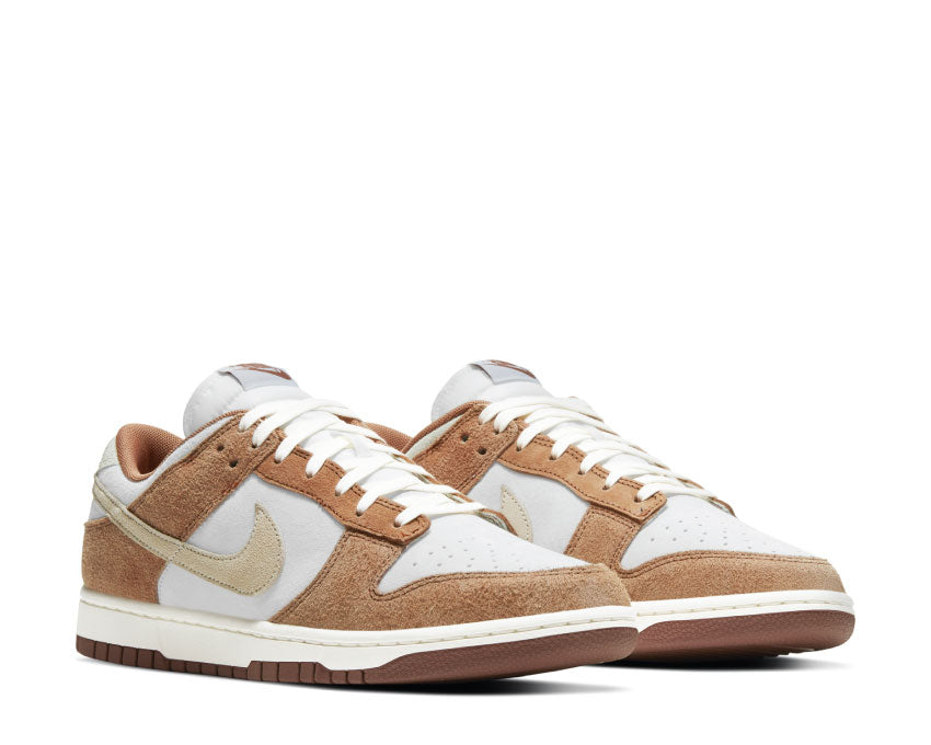 Nike Dunk Low Retro Premium Curry Sail vista lateral — cuero premium fósil